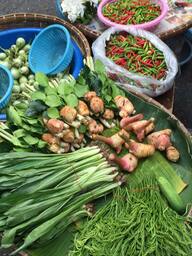 Fresh herbs stall at the morning market, Phitsanulok, Thailand.