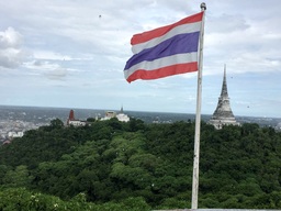 Thai flag captured on top of Phra Nakhon Khiri Palace, Phetchaburi province, Thailand.