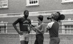 Future Hall of Famer and three-time NBA Champion with the Los Angeles Lakers, as well as Co-Most Outstanding Player on UNC's 1982 Championship Team James Worthy gets interviewed at Campbell University Basketball Camp in 1981.