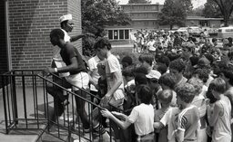 Campers at Campbell University Basketball Camp rush the dining hall for dinnertime.