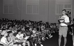 Eric Montross, part of the 1993 NCAA Championship Team at UNC and future NBA player, addresses the campers at Campbell University's basketball camp.