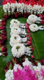 Flower garlands or Phung Malai can be made of many different types of flowers.  The ones in this specific picture are made of jasmine flowers and rose petals.  