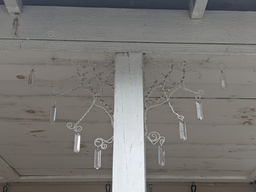 Cobweb Halloween decorations made out of wire and crystals.