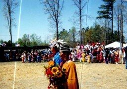 Photo of woman receiving honor at Spring Powwow circa early 2000s