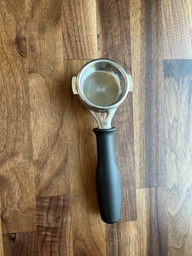 A portafilter is a part of an espresso machine which holds the grounds. Water is poured into the portafilter and espresso is dispensed out of the bottom.