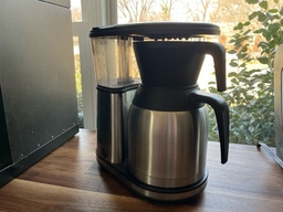 This is a typical home brewer. Coffee grounds are placed in the basket and hot water is poured over them.