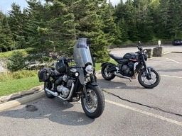 2018 Triumph Speedmaster 1200 and 2020 Triumph Trident 660, taking a breather after climbing to the peak of Mount Mitchell.