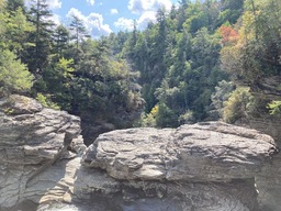 "The Linville River flows from its headwaters high on the steep slopes of Grandfather Mountain and cascades through two falls as it begins a nearly 2,000 foot descent through this rugged and spectacularly beautiful gorge. Known by the Cherokee as 'the river of many cliffs,' Linville Gorge was the nation's first officially designated wilderness area." Quoting NPS, https://www.nps.gov/blri/planyourvisit/linville-falls-mp-316.htm