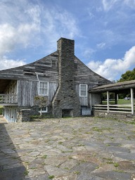 "Bluffs Lodge shows signs of the Rustic style, while also incorporating materials and design common to post-WWII park development." Quoting the NPS, https://www.nps.gov/articles/550214.htm#4/34.45/-98.53