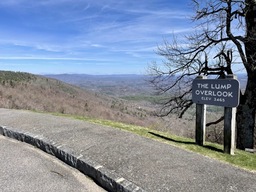 The Lump Overlook is at milepost 264.4 and sits at an elevation of 3,465 feet. It has a picnic table and access to The Lump Trail. 