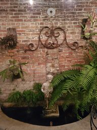 A fountain in the courtyard of the Napoleon House, located on Chartres Street.  This building was founded as a safe haven for Napoleon Bonaparte by local sympathizers but never housed him.  Today, it is a restaurant.