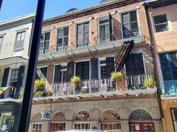 During Mardi Gras, colored beads can be seen adorning the wrought iron fences and railings of the French Quarter.